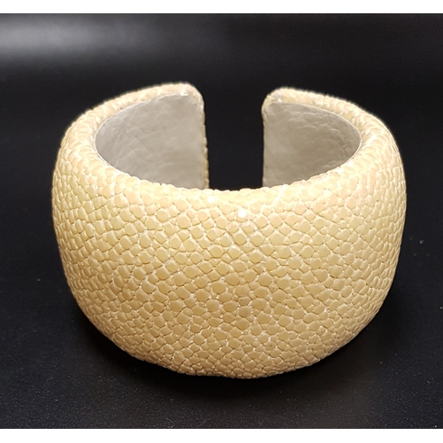 197 - CREAM COLOURED SHAGREEN BANGLE
by 'Maximo'