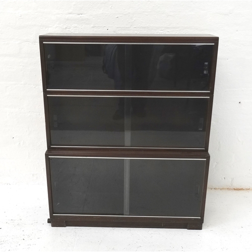 481 - MINTY MAHOGANY SIDE CABINET
with three pairs of glass sliding doors, standing on a plinth base, 108c... 