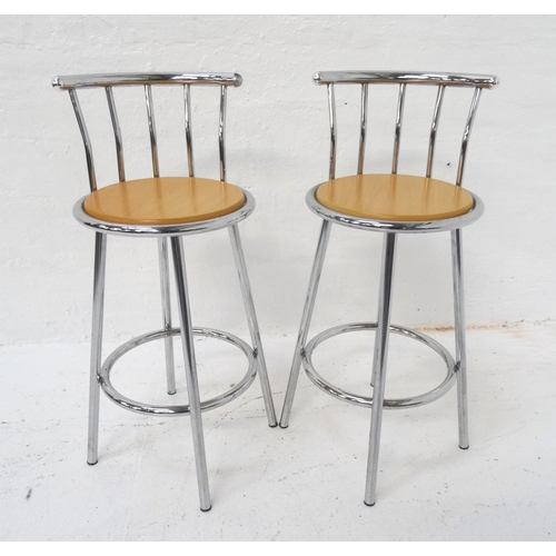 523 - PAIR OF TUBULAR STEEL KITCHEN STOOLS
with shaped backs above circular beech seats, 96cm high (2)