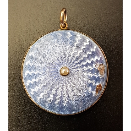 71 - ENAMEL DECORATED CIRCULAR LOCKET PENDANT
one side with glazed panel, the other with light blue guill... 