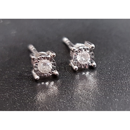 137 - PAIR OF ILLUSION SET DIAMOND STUD EARRINGS
the diamonds totalling approximately 0.1cts, in nine cara... 