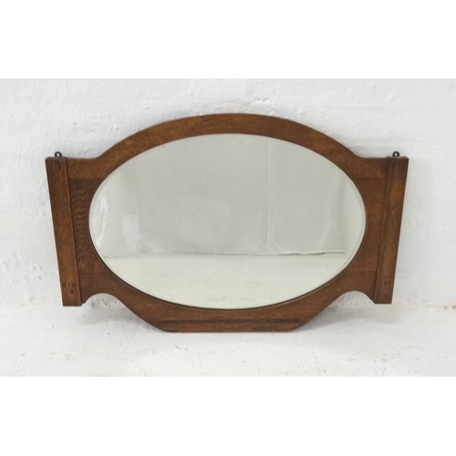 531 - OAK OVAL WALL MIRROR
in a shaped frame, originally from a dressing chest, 84cm wide