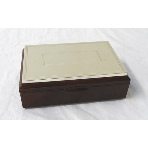 208 - SILVER AND MAHOGANY BOX
containing a new set of playing cards and three dice for the game Cee-Lo, wi... 