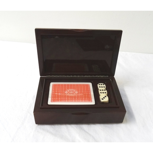 208 - SILVER AND MAHOGANY BOX
containing a new set of playing cards and three dice for the game Cee-Lo, wi... 