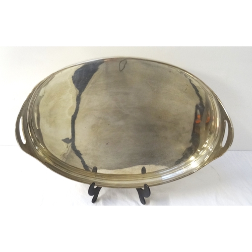 214 - LARGE SILVER PLATED OVAL TRAY
with reeded sides and pierced handles, 56cm wide