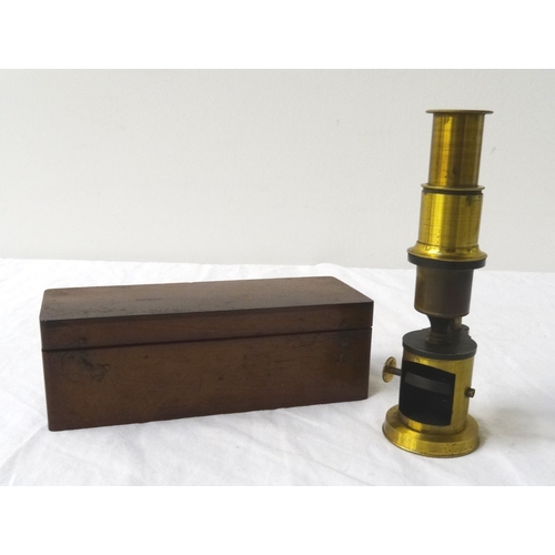 321 - BRASS TABLE MICROSCOPE
complete with tweezers and single slide, in mahogany box