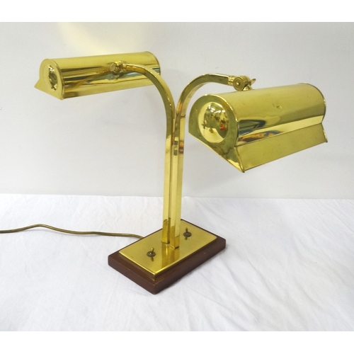 516 - DOUBLE BRASS DESK LAMP
raised on a rectangular base with two shaped columns and two adjustable lamp ... 