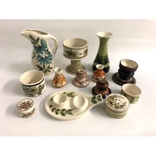 218 - SELECTION OF JERSEY POTTERY ITEMS
with a variety of floral and motif decoration, including vases, an... 