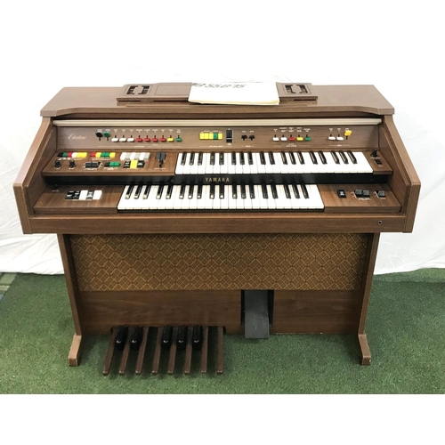 387 - YAMAHA ELECTONE ELECTRIC ORGAN
in simulated wood case, with instruction manual