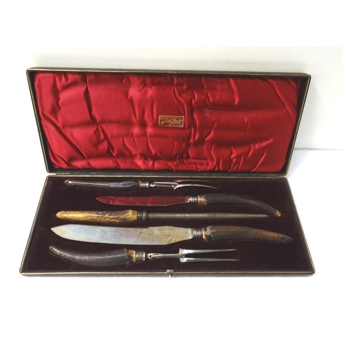 363 - VICTORIAN SILVER MOUNTED DOUBLE CARVING SET
comprising two knives and forks and a steel, all with an... 