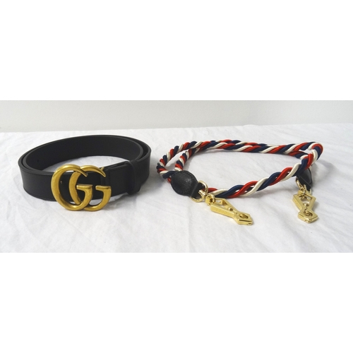 391 - GUCCI BLACK LEATHER BELT
with a double G brass buckle, in bag; together with a Gucci tri-colour rope... 