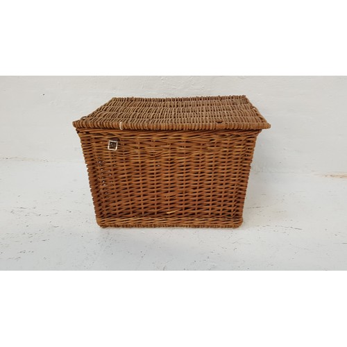 311 - WICKER PICNIC HAMPER
with a lift lid revealing a fitted interior for six bottles and a storage area,... 