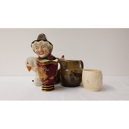 281 - SHORTER POTTERY FIGURINE OF MOTHER GOOSE
a Ridgway jug, Carlton Ware Rouge Royale vase, Burleigh War... 