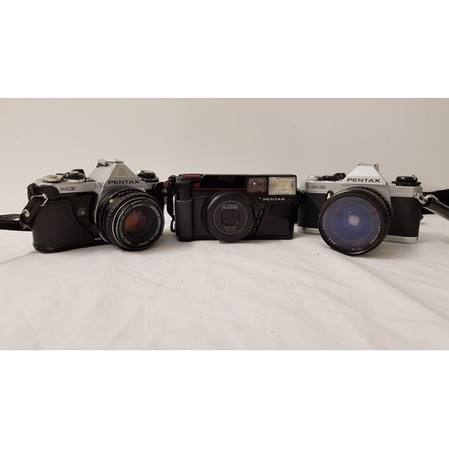 347 - PENTAX MG 35mm FILM CAMERA
with a Tokina 25-50mm lens in a Qualide carry case together with a Pentax... 