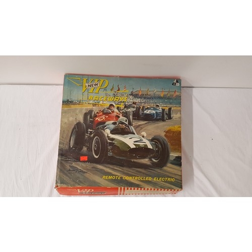 414 - V.I.P. RACEWAY RACE CAR SET
comprising two race cars, track and power bank, with original manual, bo... 