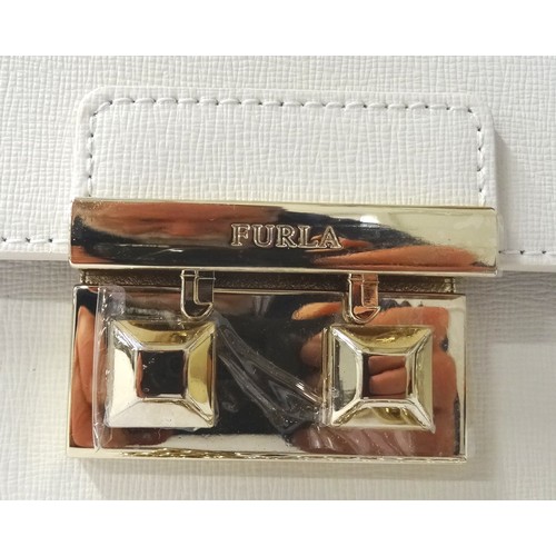 393 - NEW AND UNUSED FURLA WHITE LEATHER BELLA MINI CROSS BODY HANDBAG
with foldover click lock closure an... 