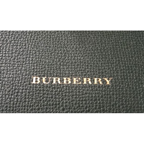 394 - NEW AND UNUSED BURBERRY MEDIUM BANNER BAG
in dark bottle green leather and signature check, with fit... 