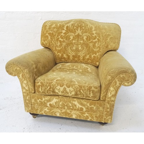 534 - VICTORIAN STYLE ARMCHAIR
with scroll arms, loose seat and back cushion, covered in a gold patterned ... 