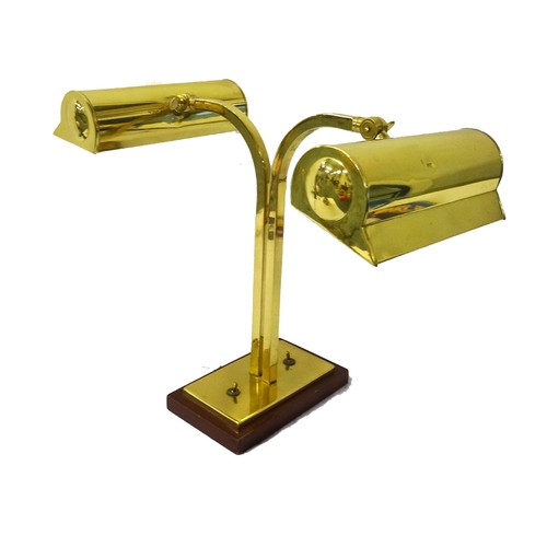 516 - DOUBLE BRASS DESK LAMP
raised on a rectangular base with two shaped columns and two adjustable lamp ... 