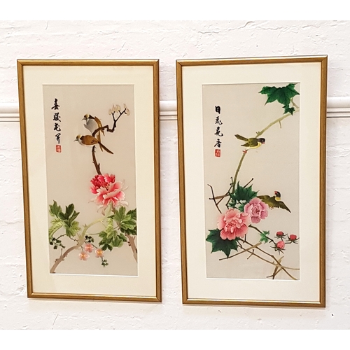 294 - PAIR OF CHINESE SILK EMBROIDERED PANELS
each depicting birds among flowers, 44cm x 20.5cm