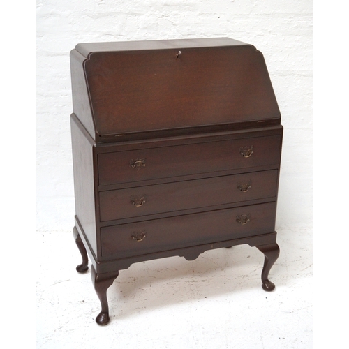 331 - 1950'S OAK BUREAU
with an inset fall flap revealing a fitted interior above three long drawers, stan... 