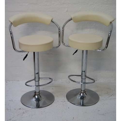 344 - PAIR OF KITCHEN BAR STOOLS
with shaped padded backs and chrome arms above circular padded seats, wit... 