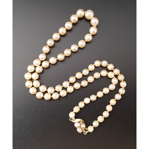 71 - GRADUATED CULTURED PEARL NECKLACE
with diamond and pearl set eighteen carat gold clasp, approximatel... 