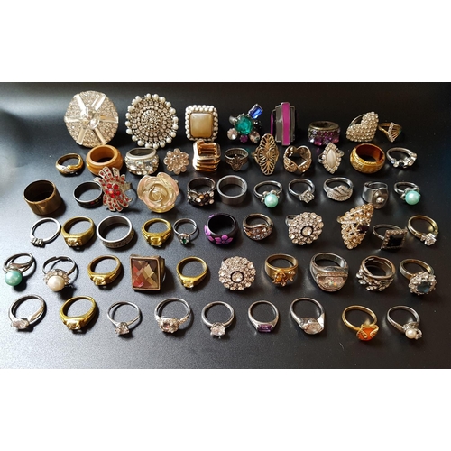 73 - SELECTION OF COSTUME JEWELLERY RINGS
of various sizes and designs, including crystal and paste set e... 