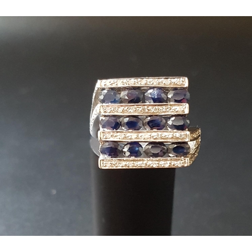 78 - UNUSUAL ART DECO STYLE SAPPHIRE AND DIAMOND DRESS RING
with alternating rows of oval cut sapphires a... 