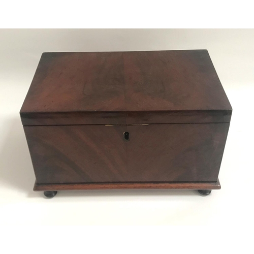 252 - GEORGIAN MAHOGANY TEA CADDY
of plain rectangular form with a lift up lid and replaced division inter... 