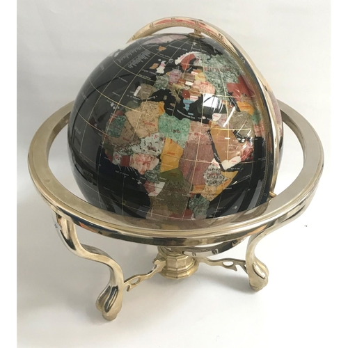 254 - SEMI PRECIOUS STONE GLOBE
with rotating action on a chrome stand, inset with lapus lazuli, mother of... 