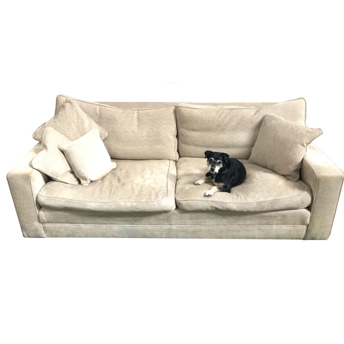 319 - LARGE FOUR SEAT SOFA
covered in an oatmeal herringbone material, with loose back and seat cushions a... 