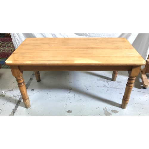 367 - BEECH FARMHOUSE STYLE TABLE
with an oblong moulded top above a plain frieze, standing on turned supp... 