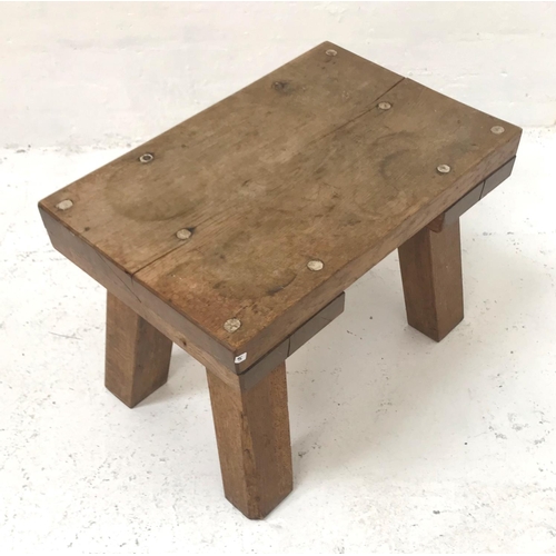 399 - ELM OCCASIONAL TABLE
with an oblong top, standing on slanted plain supports, 71cm wide