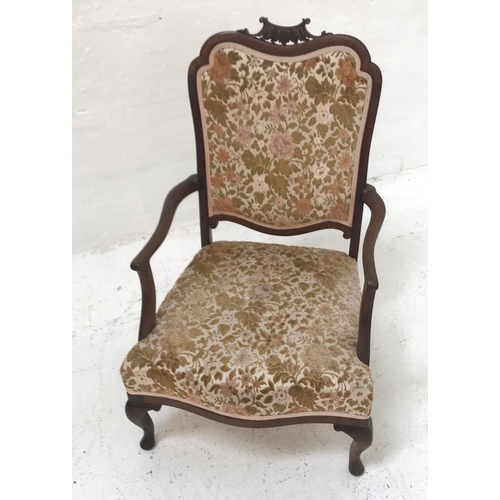 401 - EDWARDIAN MAHOGANY OPEN ARMCHAIR
with a shaped carved top rail above a padded back with shaped arms ... 