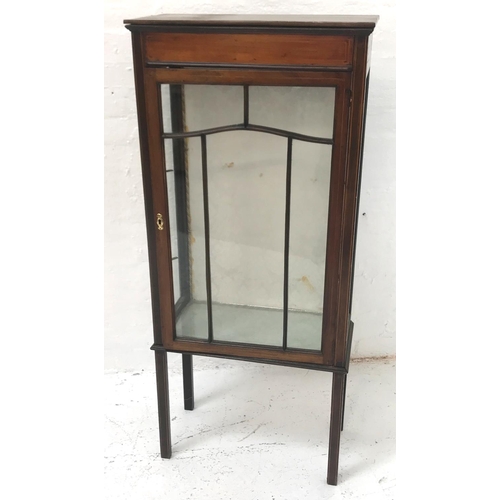 415 - EDWARDIAN MAHOGANY AND INLAID DISPLAY CABINET
with a moulded top above a pair of glazed panel doors ... 