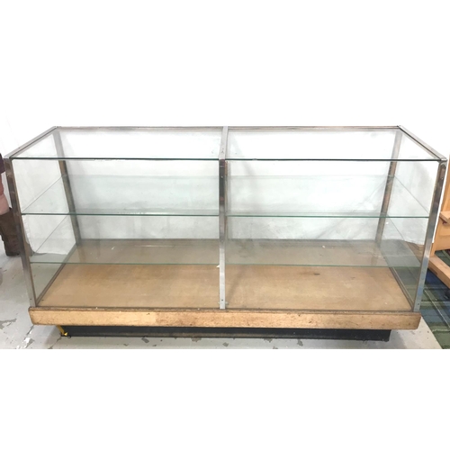 417 - VINTAGE SHOP DISPLAY COUNTER
with a glass top and sides and a sloping glass front with internal glas... 