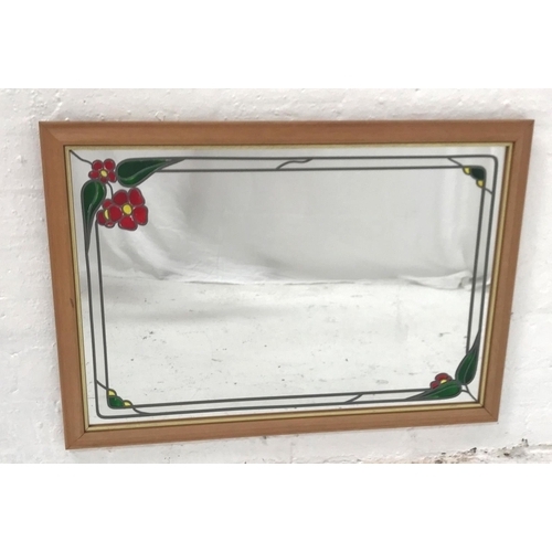 359 - OBLONG WALL MIRROR
with a floral leaded glass plate, 81.5cm wide