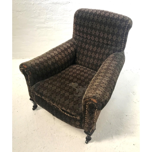 397 - LATE VICTORIAN ARMCHAIR
with a padded back and seat with scroll arms, covered in a patterned materia... 