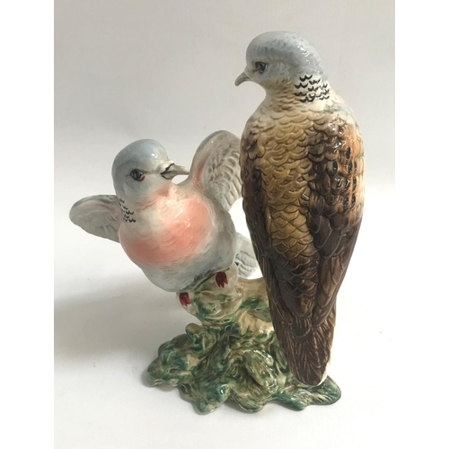 111 - BESWICK FIGURE OF A PAIR OF TURTLE DOVES
on naturalistic base, impressed number 1022, 19cm high; tog... 