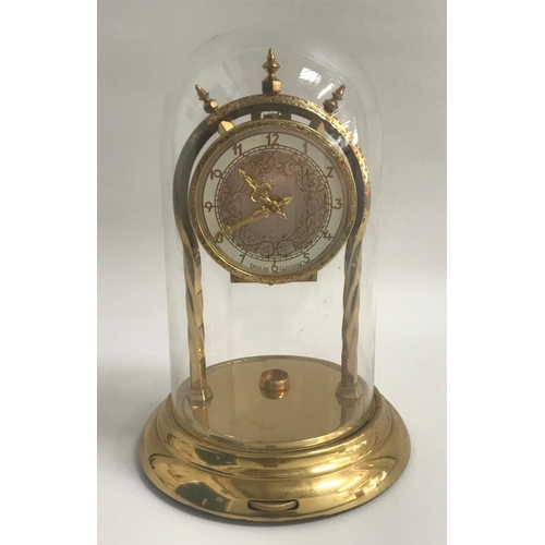 173 - GERMAN TRIBERG-BLACK FOREST 400 DAY CLOCK
the dial with Arabic numerals and gilt scroll decoration, ... 