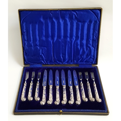 107 - CASED SIX PLACE SETTING OF EDWARD VII SILVER SEAFOOD/COCKTAIL CUTLERY
the pistol grip handles with r... 