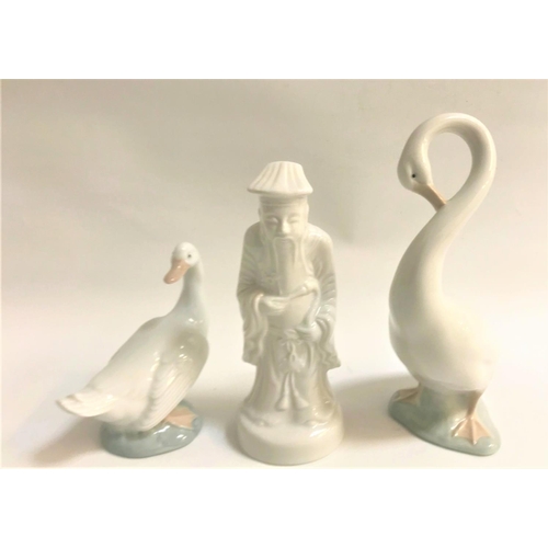 115 - NAO PORCELAIN GOOSE FIGURINE
standing upright, 20cm high, another Nao goose figurine, 12.5cm high; a... 