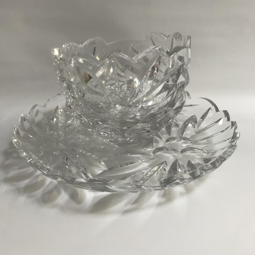 122 - EXTREMELY DECORATIVE CONTINENTAL CRYSTAL PUNCH BOWL AND TRAY
each with an irregular rim , the bodies... 