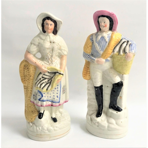 142 - PAIR OF STAFFORDSHIRE FLATBAACK FIGURES
of a man and a woman, both holding a basket a fish, 34cm and... 