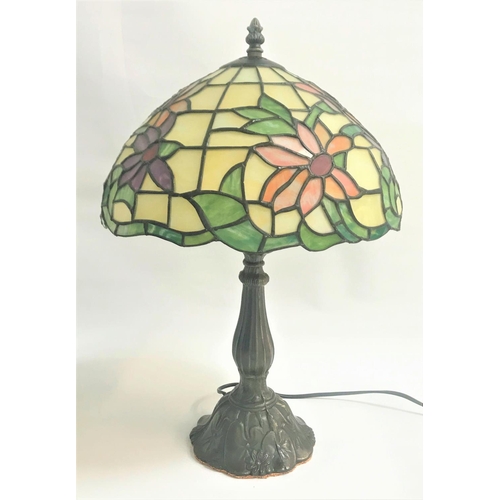 159 - TIFFANY STYLE TABLE LAMP
with a floral domed leaded glass shade on a tapering and shaped column with... 