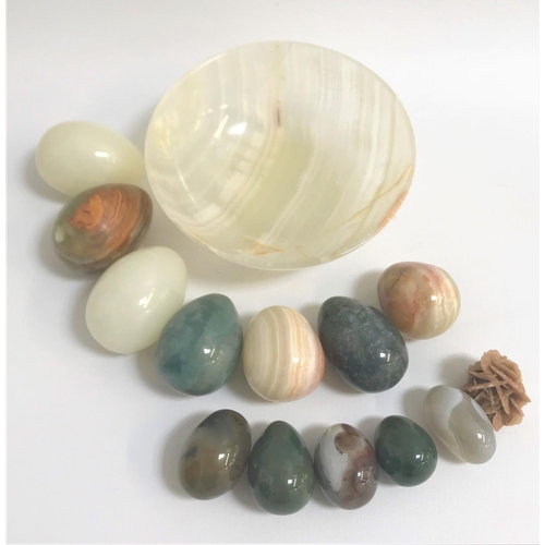 161 - SELECTION OF POLISHED STONE EGGS
of various sizes and colour, together with a polished stone bowl