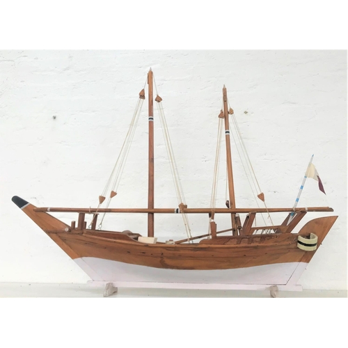 167 - TEAK TWIN MAST MODEL OF A SCHOONER
with rigging and moving rudder, bearing a presentation plaque, 10... 