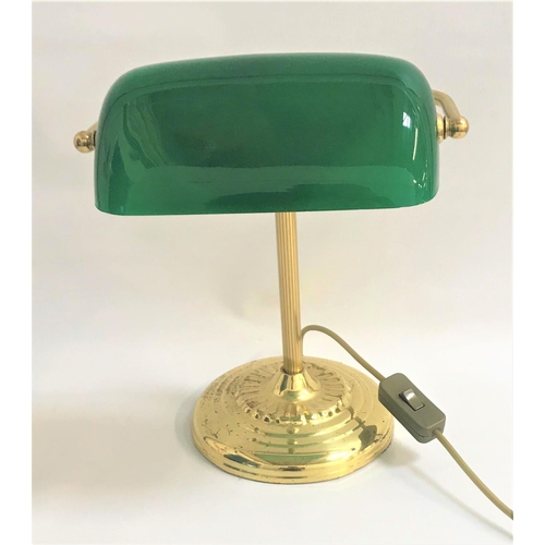 185 - BRASS DESK LAMP
raised on a circular stepped base with a tubular column and green glass shade, 35cm ... 