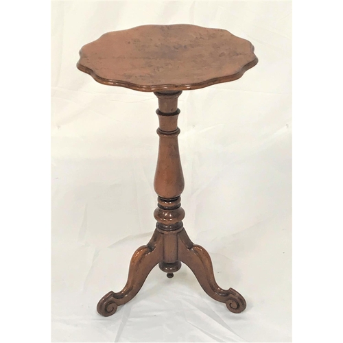 459 - WALNUT TRIPOD WINE TABLE
with a burr wavy rim top on a turned column with three outswept supports, 7... 